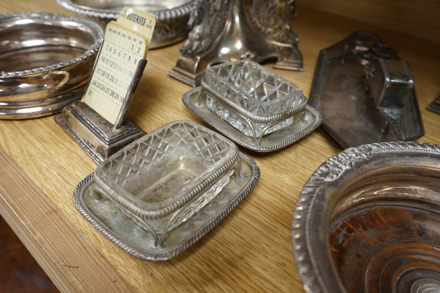 Pair of Victorian plated centerpieces and a small collection of other plated wares to include wine coasters, largest 18cm high